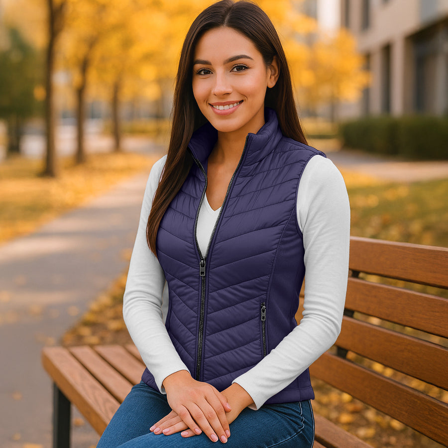 Chaleco Acolchado Mujer Ligero e Impermeable · Cuello Alto color Azul Marino