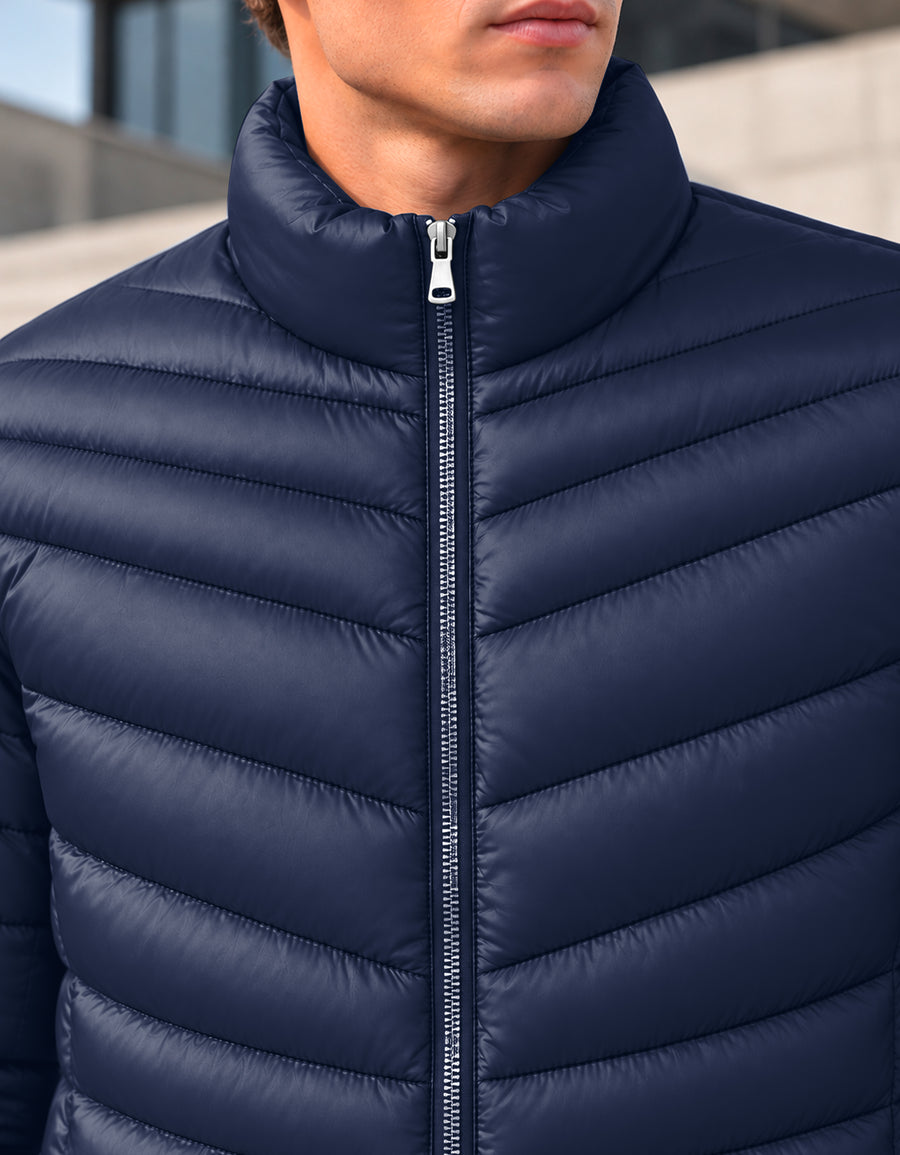 Chamarra Acolchada Hombre Ligera e Impermeable · Cuello Alto color Azul Marino
